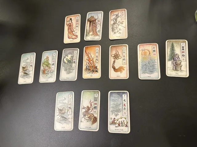 Mahjong tiles alongside tarot cards